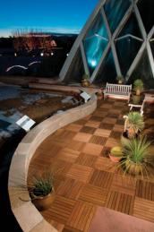 Bison adjustable pedestals support elevated Ipe wood tiles